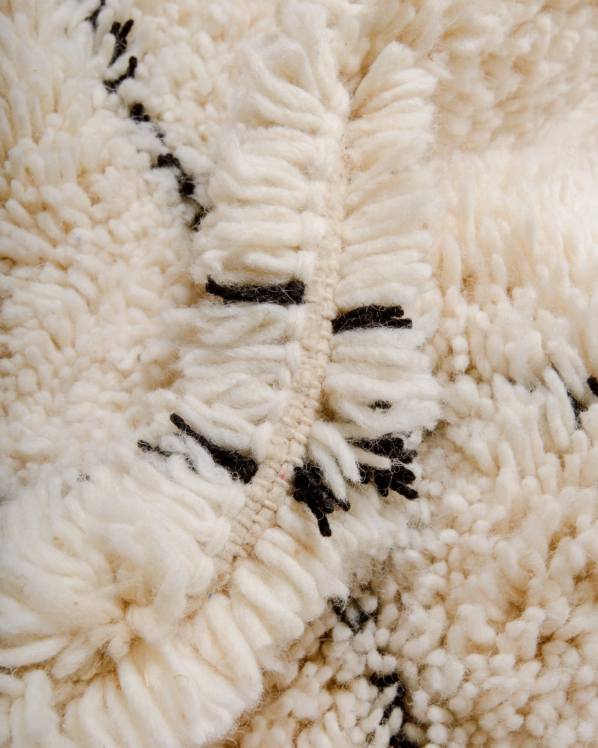 Close up of Beniourain rug showing density and thickness of wool.